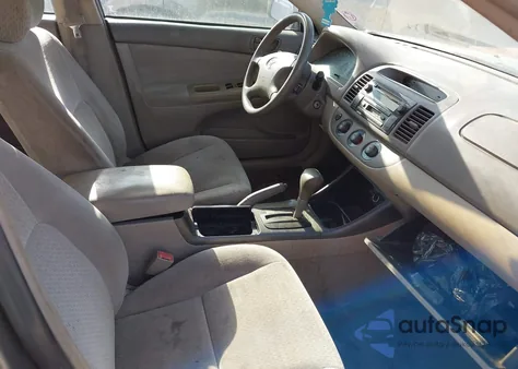 2003 Toyota Camry Le z USA, uszkodzony, nr VIN 4T1BE30K13U725595